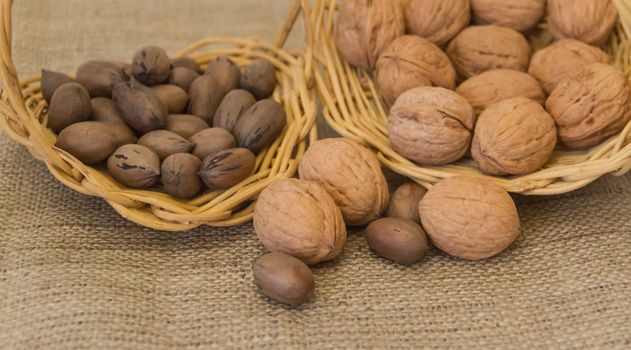 variety of healthy nuts on rustic background