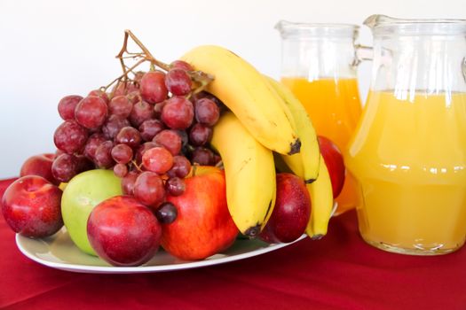 variety of fresh fruits served on a plate