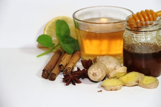 healthy tea of ginger mint lemon cinnamon curcuma anis and honey