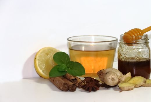 healthy tea of ginger mint lemon cinnamon curcuma anis and honey