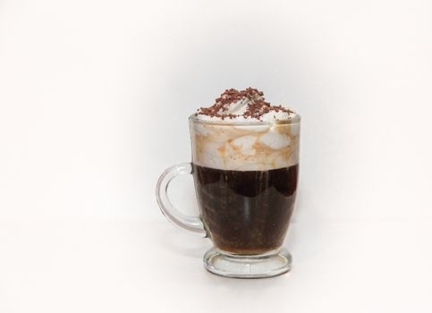 espresso irish coffee with cream and chocolate on white background