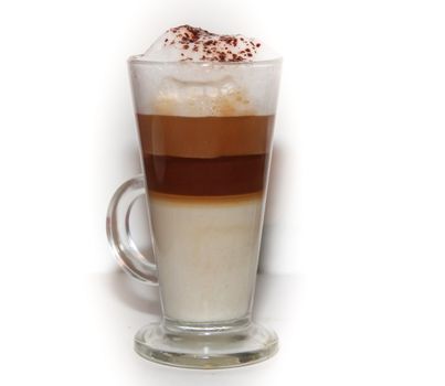 cappuccino in tall glass on white background