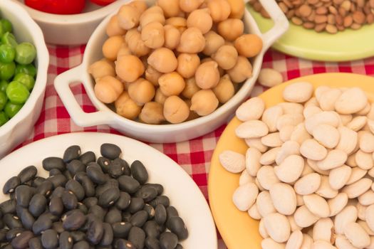 variety of kitchen ingredients with fresh and dried legumes