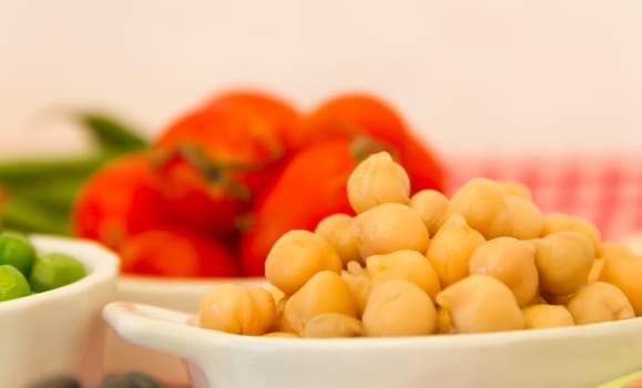 variety of kitchen ingredients with fresh and dried legumes