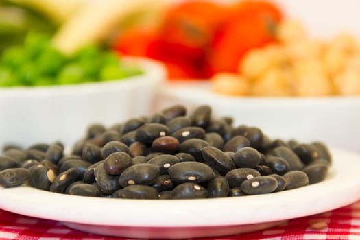 variety of kitchen ingredients with fresh and dried legumes