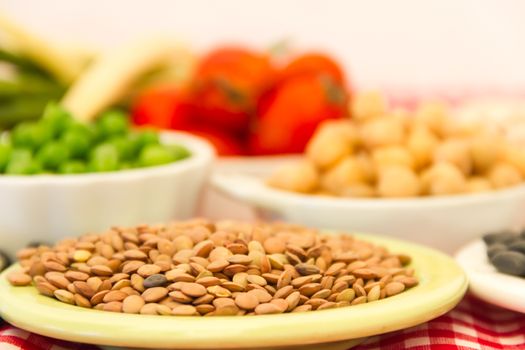 variety of kitchen ingredients with fresh and dried legumes