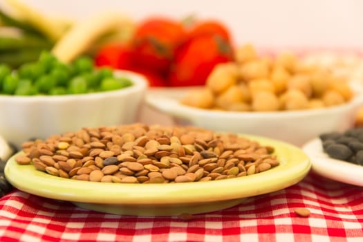 variety of kitchen ingredients with fresh and dried legumes