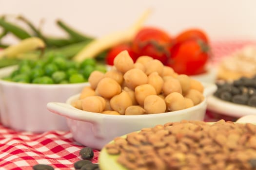 variety of kitchen ingredients with fresh and dried legumes