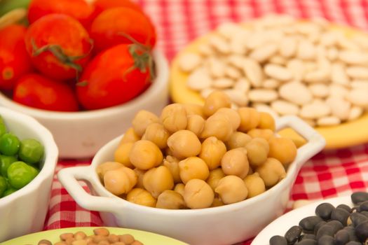 variety of kitchen ingredients with fresh and dried legumes