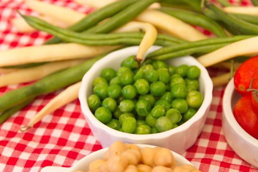 variety of kitchen ingredients with fresh and dried legumes