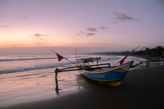 Boat on a beach when sunset come at Pangandaran Beach Indonesia