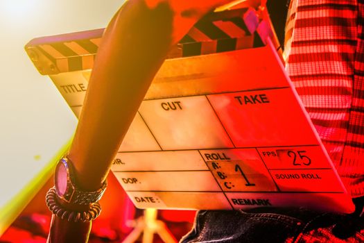 Film production crew, close up of movie Clapper board