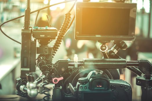 Film industry. Filming with professional camera background
