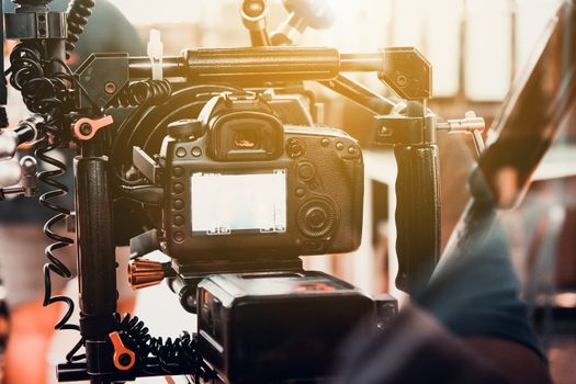 Film industry. Filming with professional camera background