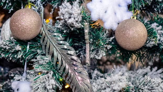 bright colored toys on a Christmas or new year tree