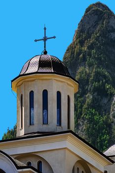 Caraiman Monastery Church against the Peak of Bucegi Mountains