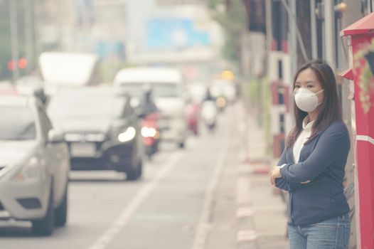 woman wearing protective mask in the city street, Bangkok thailand