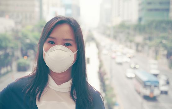 woman wearing protective mask in the city street, Bangkok thailand