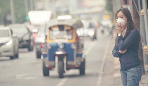 woman wearing protective mask in the city street, Bangkok thailand