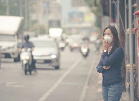 woman wearing protective mask in the city street, Bangkok thailand