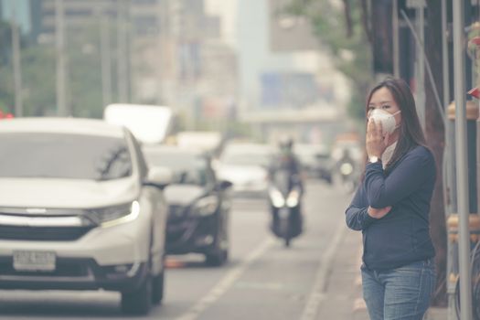 woman wearing protective mask in the city street, Bangkok thailand