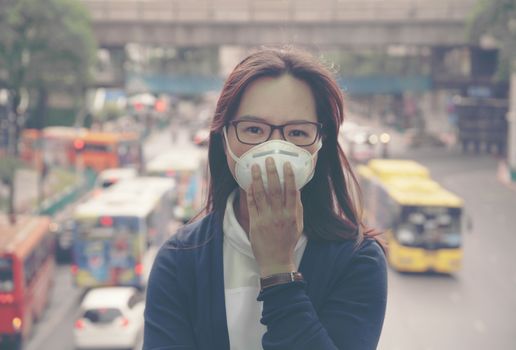 woman wearing protective mask in the city street, Bangkok thailand