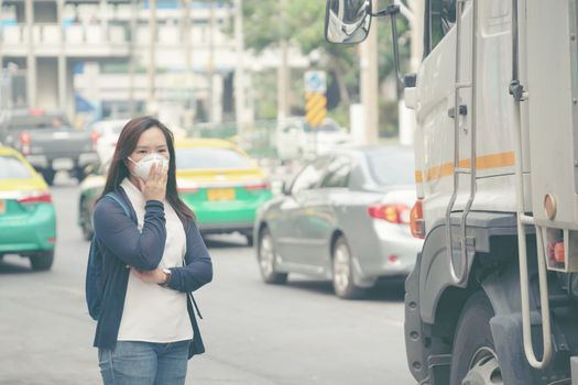 woman wearing protective mask in the city street, Bangkok thailand