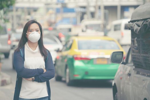 woman wearing protective mask in the city street, Bangkok thailand