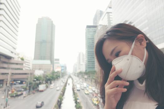 woman wearing protective mask in the city street, Bangkok thailand