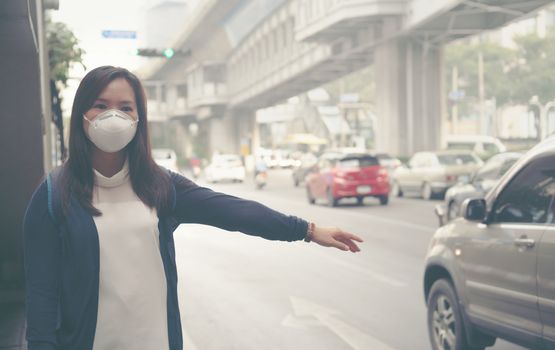 woman wearing protective mask in the city street, Bangkok thailand