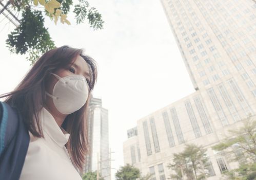 woman wearing protective mask in the city street, Bangkok thailand