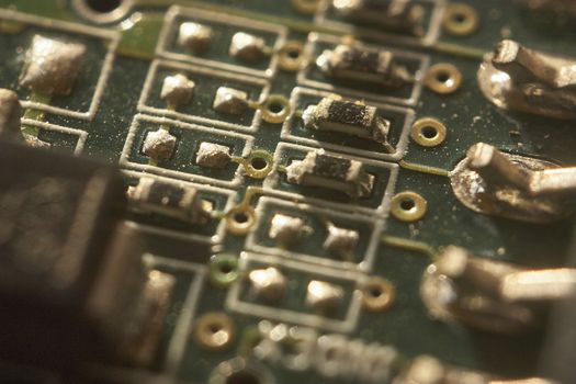 Super magnification of some welding and electronic components of a board, micro components that are part of a printed circuit.