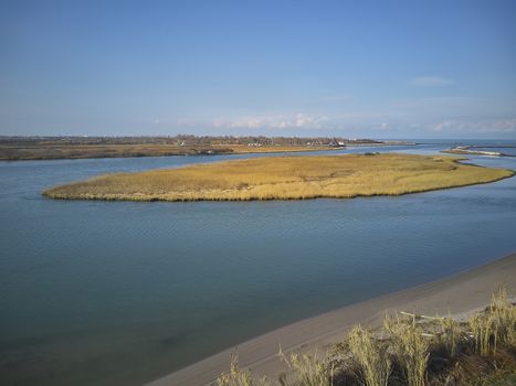 Aerial view of the mouth of the river Po in Italy; a unique and uncontaminated landscape seen by the eye of a drone.