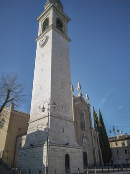 Wide angle view of a historic church from a small town in northeastern Italy.