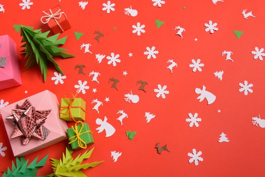 Christmas or New Year background, plain composition made of Xmas decorations and fir branches, flat lay, blank space for a greeting text.