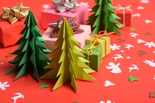 Christmas or New Year background, plain composition made of Xmas decorations and fir branches, flat lay, blank space for a greeting text.