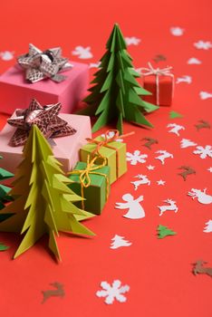 Christmas or New Year background, plain composition made of Xmas decorations and fir branches, flat lay, blank space for a greeting text.