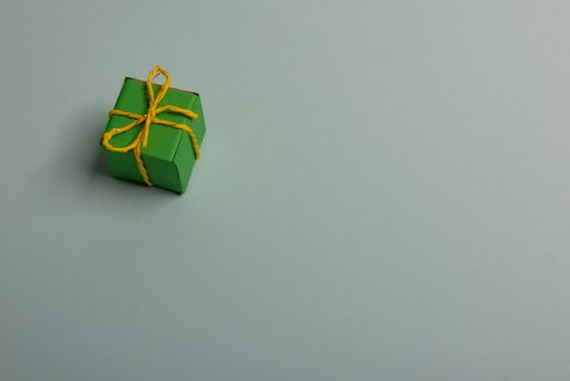 christmas presents nicely decorated with bows and feathers. view from above