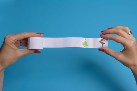 Long twisted expanded letter for Santa Claus. Copy space. yellow background