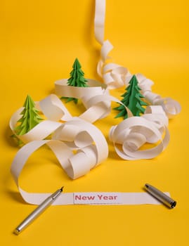 Long twisted expanded letter for Santa Claus. Copy space. yellow background. New Year text