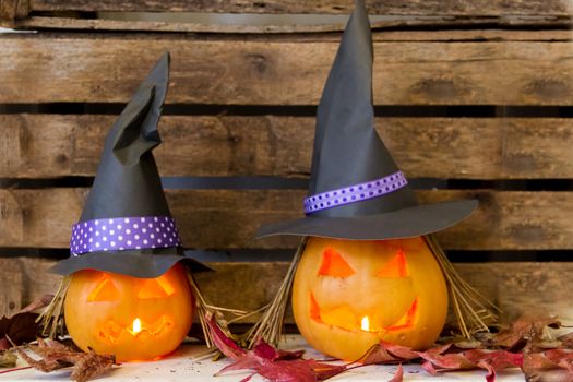 original decorations with pumpkins and halloween witch hats