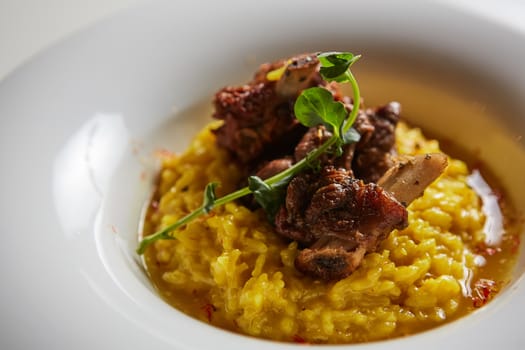 The ossobuco and saffron risotto. Shallow dof.