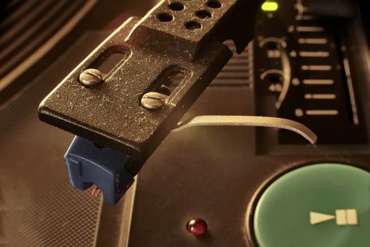 Detail of the needlework of a vintage turntable with macro lens.