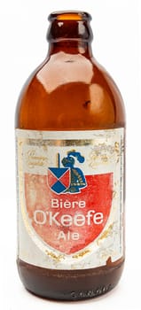 Old O’keefe beer bottle isolated on a white background