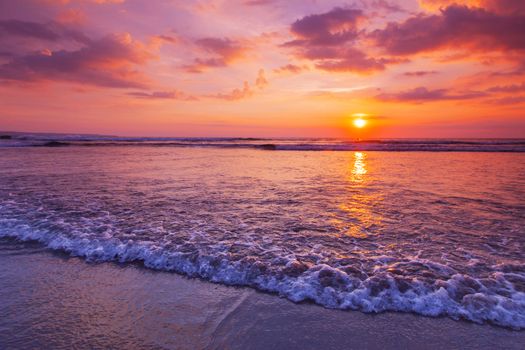 Radiant colorful sea beach sunset on Bali, Indonesia