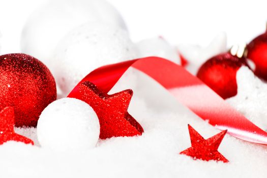Christmas card with beautiful decorations in snow isolated on white