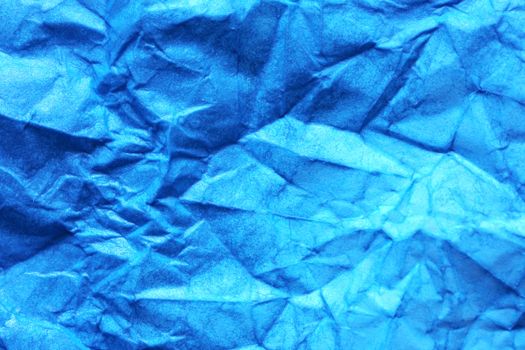 Nice background made from wet blue crumpled paper