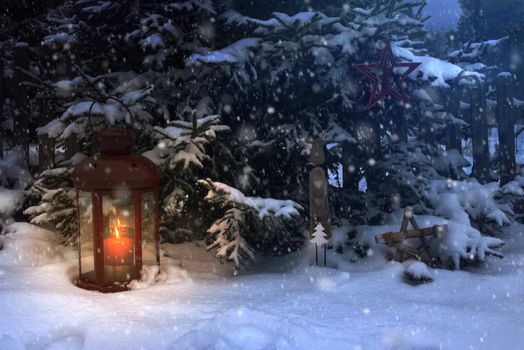 Christmas lamp with glass and candle inside in the night to pine tree. Snowing around the lamp. Snowflakes flying in the night.