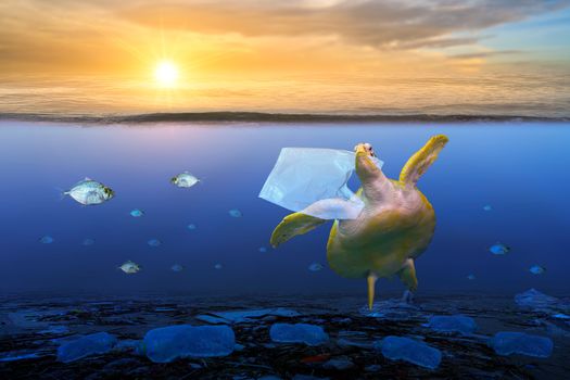 plastic ocean turtle are eating plastic bags under the blue sea. Environmental conservation concepts and not throwing garbage into the sea