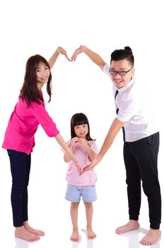 Asian family making heart shape with hands